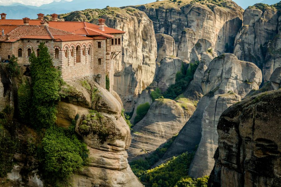 View of the Meteora monastery in Greece on top of green mountains